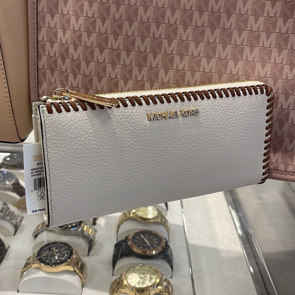 Michael Kors Jet Set Travel Large Pebble Leather Quarter-Zip Wallet
NWT